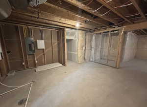 Basement featuring electric panel