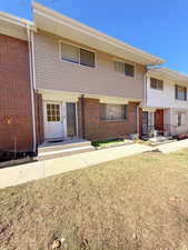 View of front of house with a front lawn