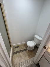 Bathroom with walk in shower and toilet