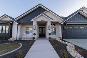 View of front of property featuring a garage