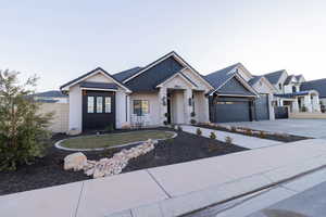 View of front of property featuring a garage