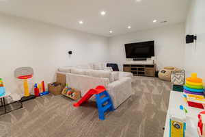 Game room with carpet floors