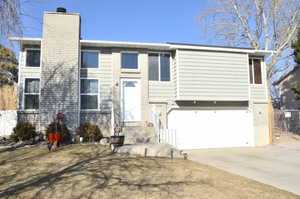 View of front of home featuring a garage