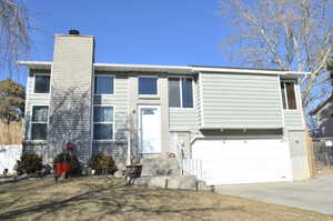 View of front of home featuring a garage