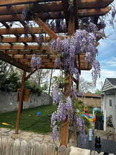 View of yard featuring a pergola