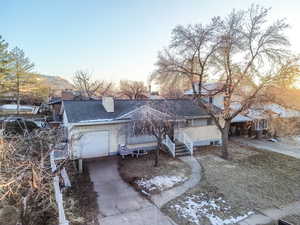 Ranch-style home featuring a garage