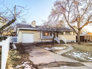 View of front of house with a garage