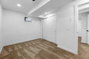 Basement featuring carpet floors