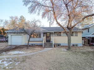 View of front of home featuring a garage