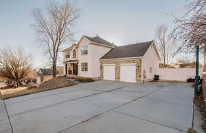 View of home's exterior with RV parking.