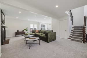 Living room with a premium fireplace.