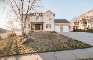 Front of property featuring a garage.