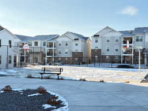 View of property's community featuring basketball court