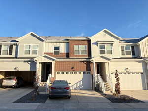 View of property featuring a garage