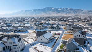 Snowy aerial view with a mountain view