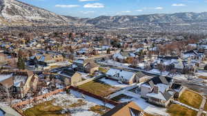 Snowy aerial view with a mountain view