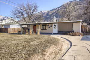 Single story home with a mountain view