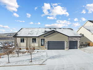 View of front of house with a garage