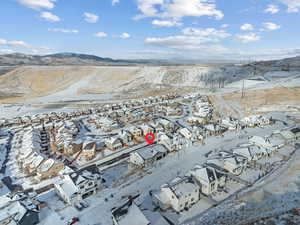 Snowy aerial view with a mountain view