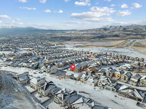 Snowy aerial view with a mountain view