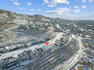 Snowy aerial view with a mountain view