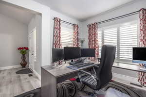 Office area featuring light wood-type flooring