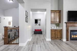 Hallway featuring light hardwood / wood-style flooring