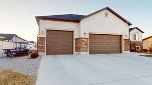 Single story home with a garage