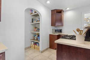 kitchen with gas stovetop.