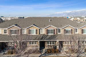 View of front of property with a mountain view