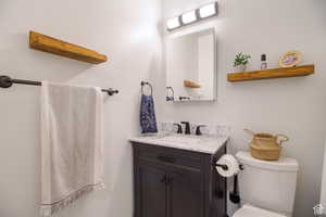 Bathroom with vanity and toilet