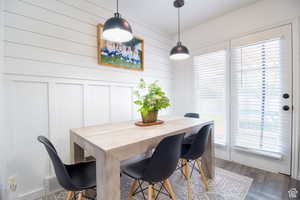 Dining space featuring hardwood / wood-style flooring