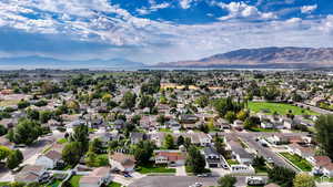 Birds eye view of property featuring a mountain view