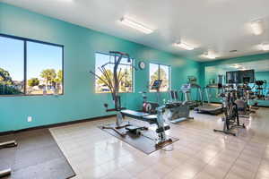 Exercise room with a textured ceiling