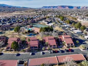 Birds eye view of property with a mountain view