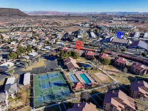 Birds eye view of property with a mountain view