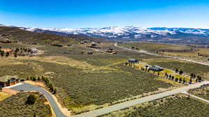 Birds eye view of property featuring a rural view and a mountain view