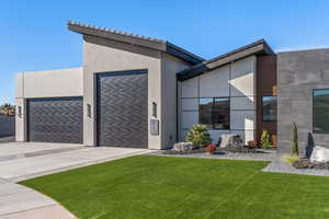 View of front of house featuring a front yard