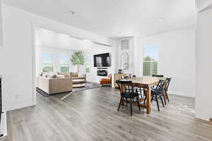 Dining area with light wood-type flooring