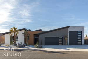 Contemporary home featuring a garage