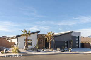 Contemporary house featuring a garage