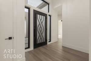 Entryway featuring hardwood / wood-style floors