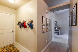 Corridor with wood-type flooring