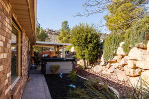 View of yard featuring a hot tub