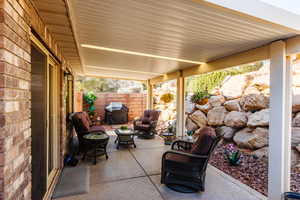 View of patio / terrace featuring a grill