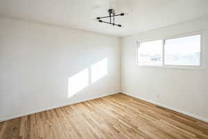 Spare room featuring light hardwood / wood-style flooring