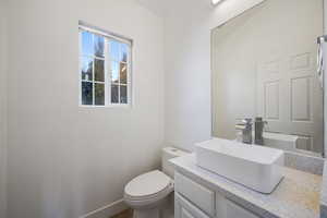 Bathroom with vanity and toilet