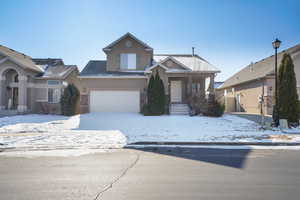 View of front of home featuring a garage