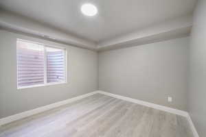 Spare room featuring light hardwood / wood-style flooring