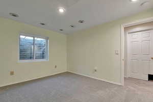 View of carpeted spare room